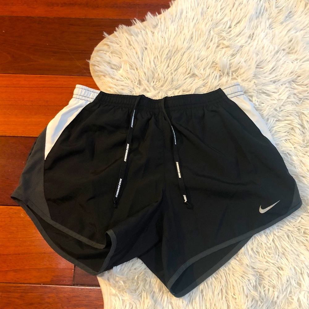 Black and white Nike running shorts